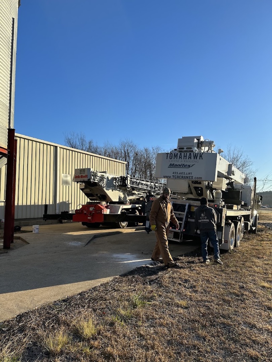 Heavy equipment on site for a large technical tree removal